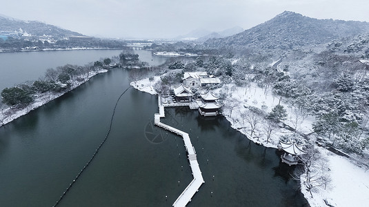 湖岸建筑杭州雪景风光背景