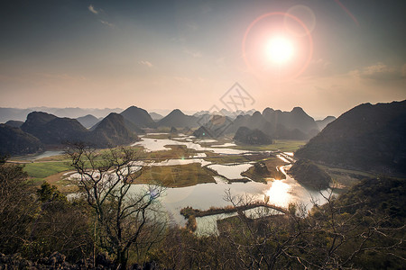 太阳光圈素材云南普者黑风光背景