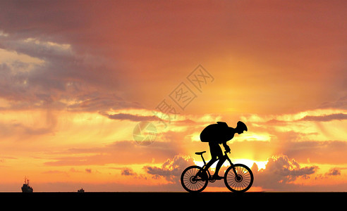 夕阳骑车人剪影夕阳下骑车人设计图片