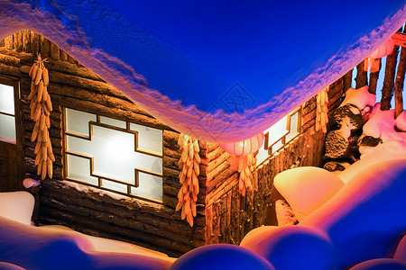 童话里的小房子雪乡夜景背景