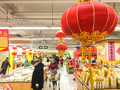 春节盆栽大促销超市里的年味背景