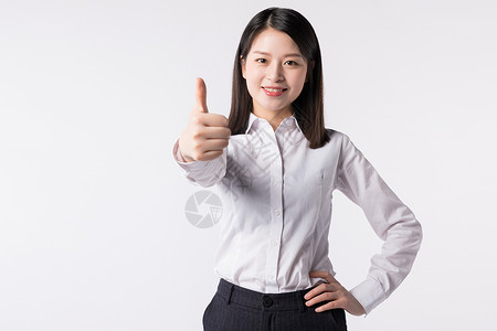 商务女性白领竖大拇指点赞图片