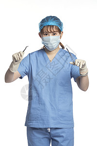 医生手拿手术剪刀手拿手术刀的医生背景