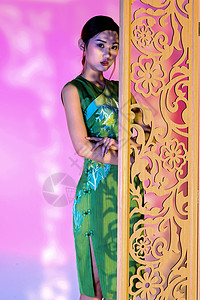 旗袍美女创意光影拍摄背景图片