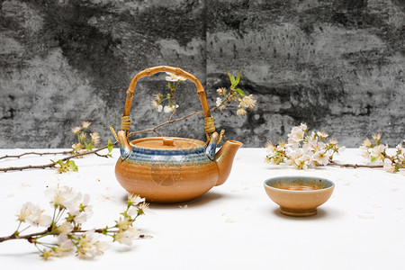 樱花和日式茶具背景图片