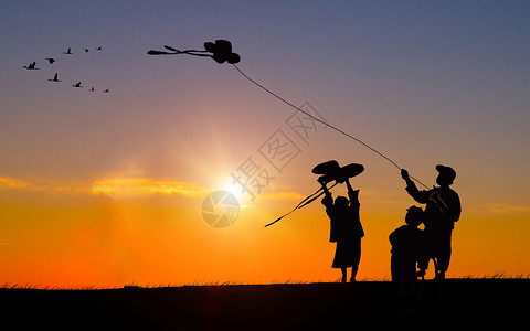 阳光儿童黄昏下放风筝剪影设计图片