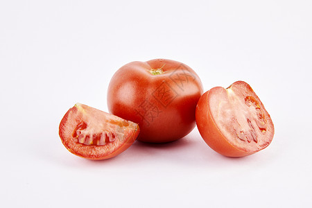 蔬果切片切开的番茄和完整的番茄背景
