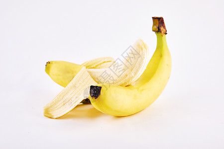 剥开的香蕉与完整的香蕉高清图片