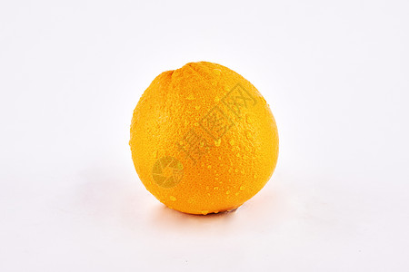 一个新鲜完整的橙子图片