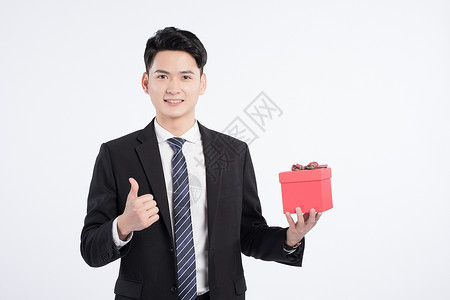 企业形象展示商务人士手持礼物盒展示背景