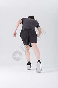 健身运动员跑步冲刺背影高清图片