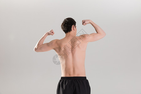 展示力量健身男性背部肌肉展示背景