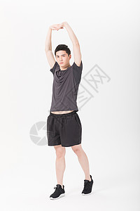 男性健身肢体拉伸热身动作图片