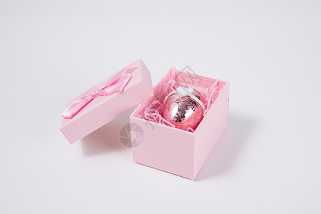 粉色小清新点缀粉色礼物盒里的彩蛋背景