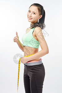 青年女性测量身材背景图片