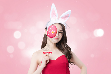 粉色兔兔边框拿着彩蛋的女孩设计图片