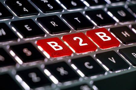 红色指示牌电脑键盘上特写的B2B设计图片