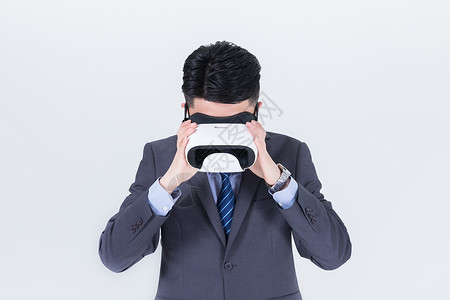 男性商务VR眼镜背景图片