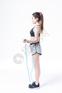 女性运动健身跳绳背景图片