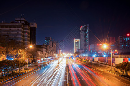 霓虹街景立交桥看城市车轨背景