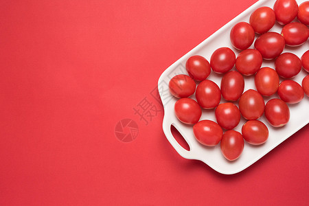 红色十一海报设计感新鲜健康低卡圣女果小番茄背景