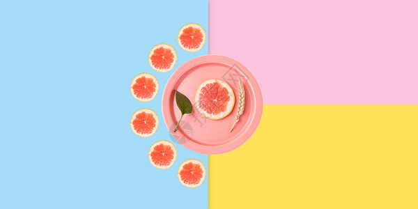 新鲜水果枇杷创意西柚切片背景设计图片