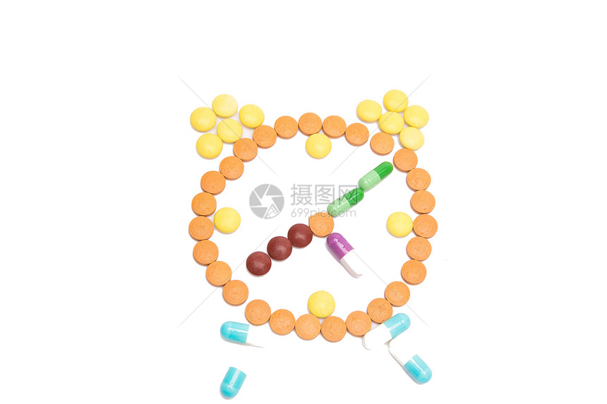 摆成闹钟形状的药物图片