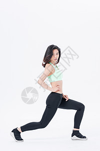 运动健身女性压腿动作背景图片