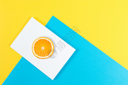 橙子切片创意撞色背景设计图片