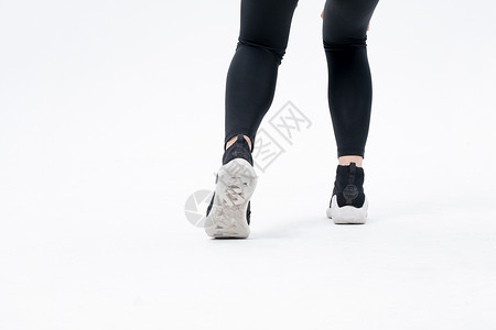 年轻运动女性脚步特写背景图片