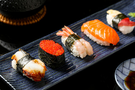 鳗鱼美食日式料理美食手握寿司背景