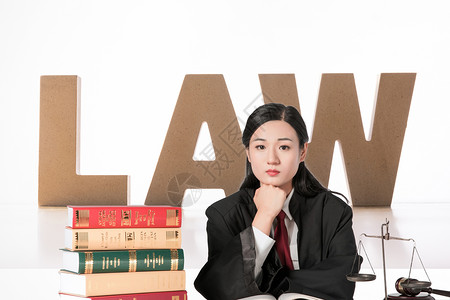 凳子上书创意法律背景设计图片