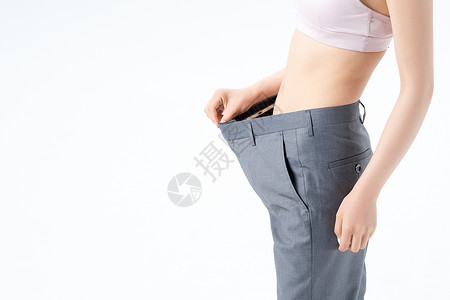 运动美女减肥成功宽松裤子背景
