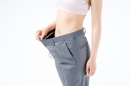 健身女性成功减肥运动美女减肥成功宽松裤子背景