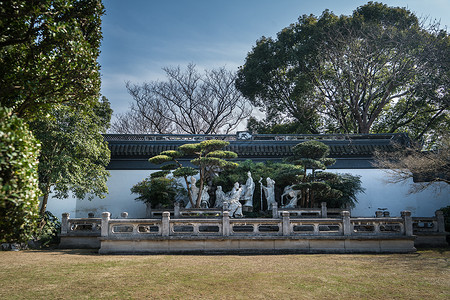 墙底草地素材上海桂林公园主题雕塑墙背景
