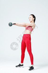 红色喷水壶健身女性壶铃力量训练背景