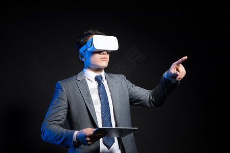 VR玩转未来创意商务男性人像vr眼镜科技背景