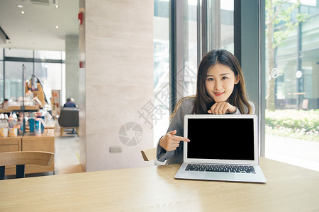 商务女性咖啡馆电脑办公图片