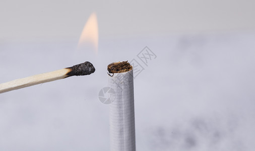 火柴创意摆设火柴和烟背景