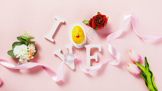 粉色背景上的LOVE字母高清图片