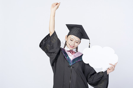 拿着文字框的毕业女学生图片