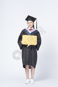 带信封对话框拿着文字框的毕业女学生背景