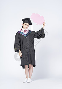 云形状对话框拿着文字框的毕业女学生背景