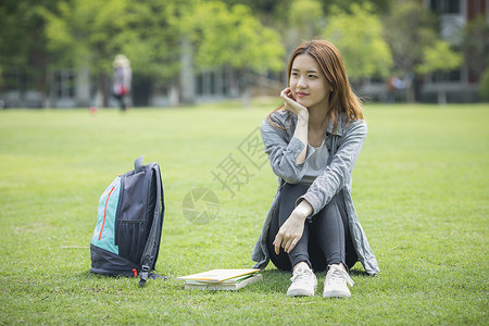 卡通女大学生青春洋溢的女大学生背景