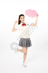 粉色气泡对话框拿着粉色气泡框的女高中生背景