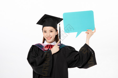 蓝色波点对话框拿着蓝色气泡对话框的毕业生背景