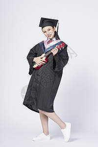 拿着尤克里里的毕业女学生图片
