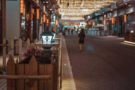 灯光行人步行街道夜景背景