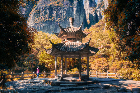 打伞古风男人雁荡山景区凉亭背景