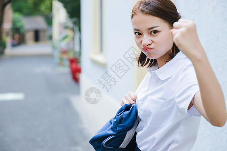 嘟嘴可爱女孩写真可爱的女生背景